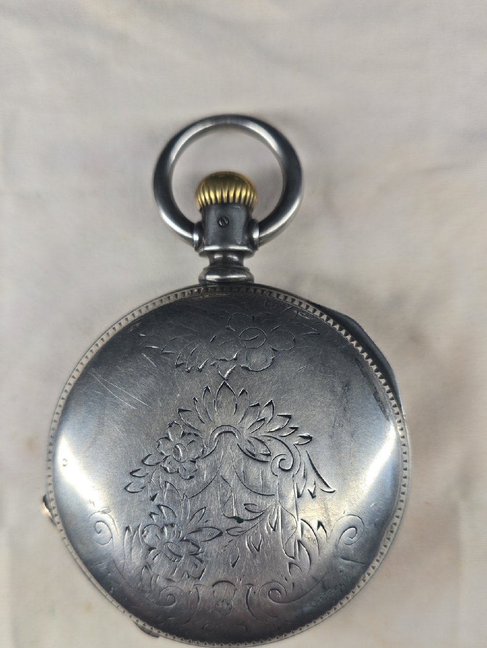 Dueber Coin Silver Floral Engraved Pocket Watch with Gold Crown